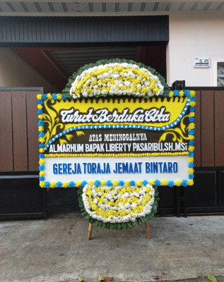 Papan Bunga Duka di Kestalan